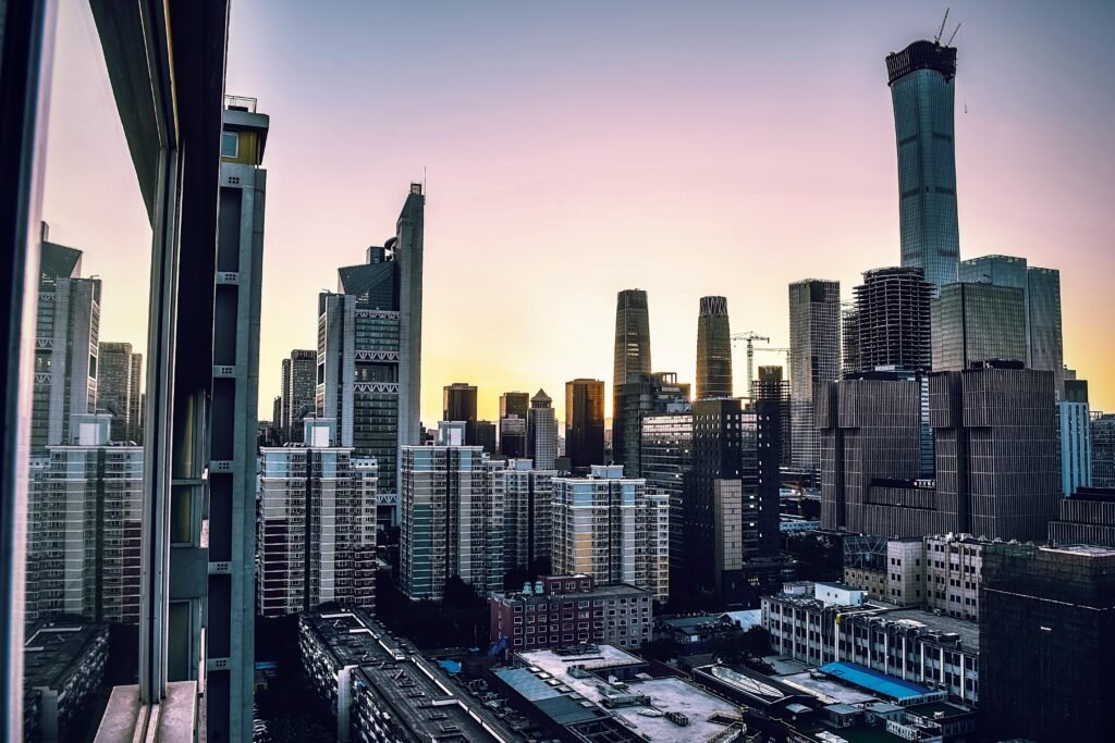 Captivating cityscape featuring modern skyscrapers against a twilight sky, perfect for urban-themed projects.