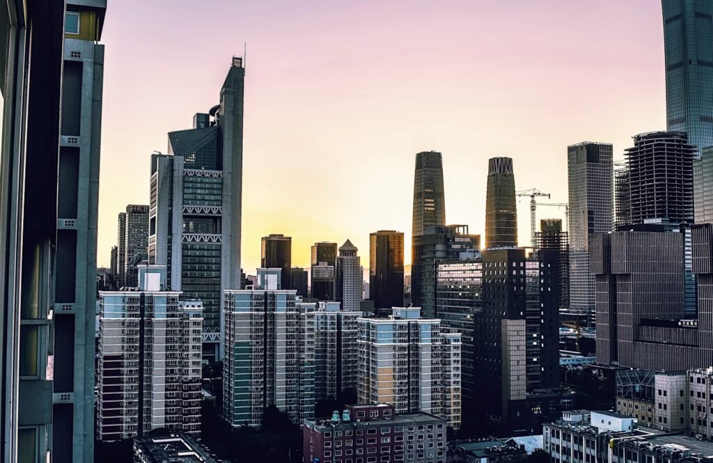 Captivating cityscape featuring modern skyscrapers against a twilight sky, perfect for urban-themed projects.