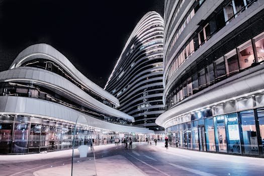 Explore the striking modern architecture of Beijing's iconic cityscape under a night sky. condominio