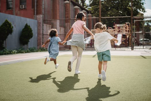 Three kids running joyfully on a sunny playground, embodying happiness and childhood fun. criança